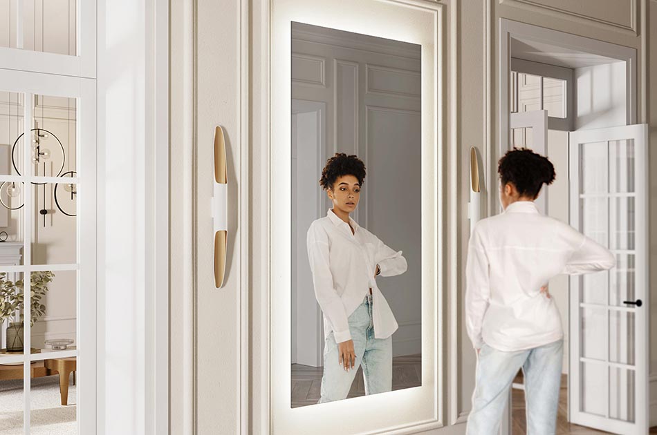 Die erhabensten Spiegel aus unserer Kollektion haben eine glatte, transparente Glasoberfläche ohne Rahmen. Die zarten Formen des Spiegels bringen Leichtigkeit in jedes Badezimmer und dank ihres dekorativen Charakters schaffen sie eine einzigartige Atmosphäre. Die fantasievolle LED-Beleuchtung lässt die Wand erstrahlen und stellt den Spiegel auf beeindruckende Weise hervor.